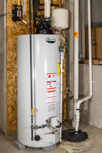 close up on residential water heater in basement