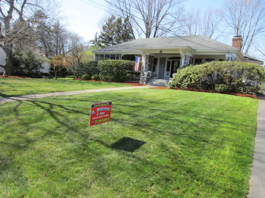 Lawn cut, trimmed and beds mulched