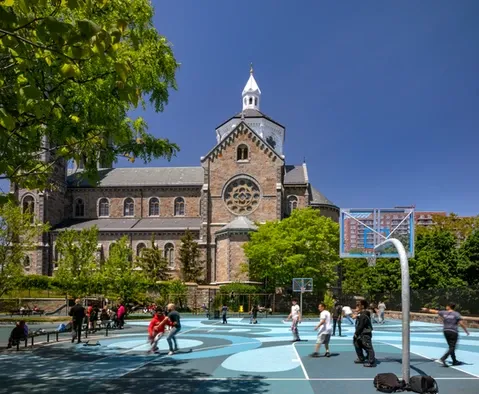 People playing basketball at Mission Hill Playground