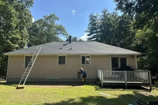 Completed ranch-style roof replacement with new shingles in Derry NH