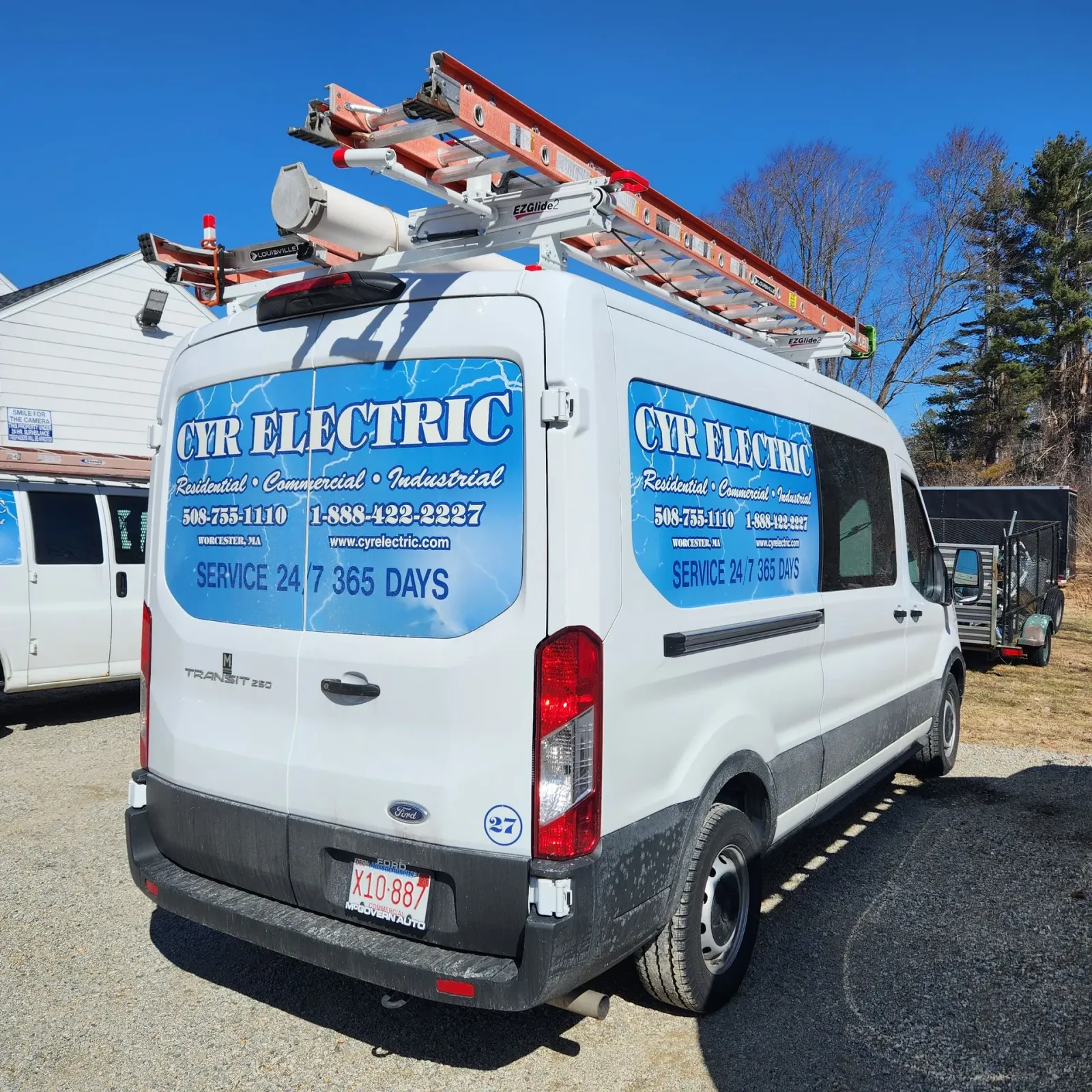A white van with the word electric on the back