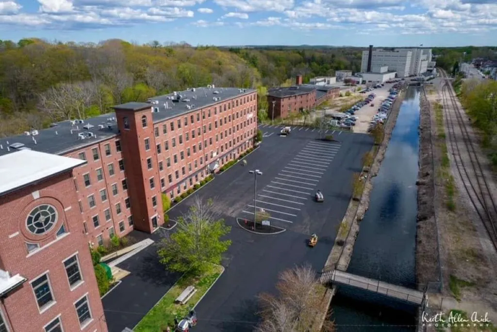Brick mill complex and parking lot