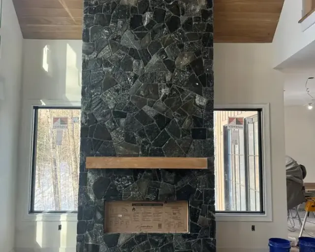 Stone Fireplace in Massachusetts by Br Construction Corp