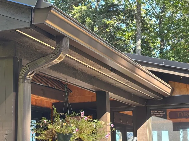 Bronze gutter on lakeside Maine cottage
