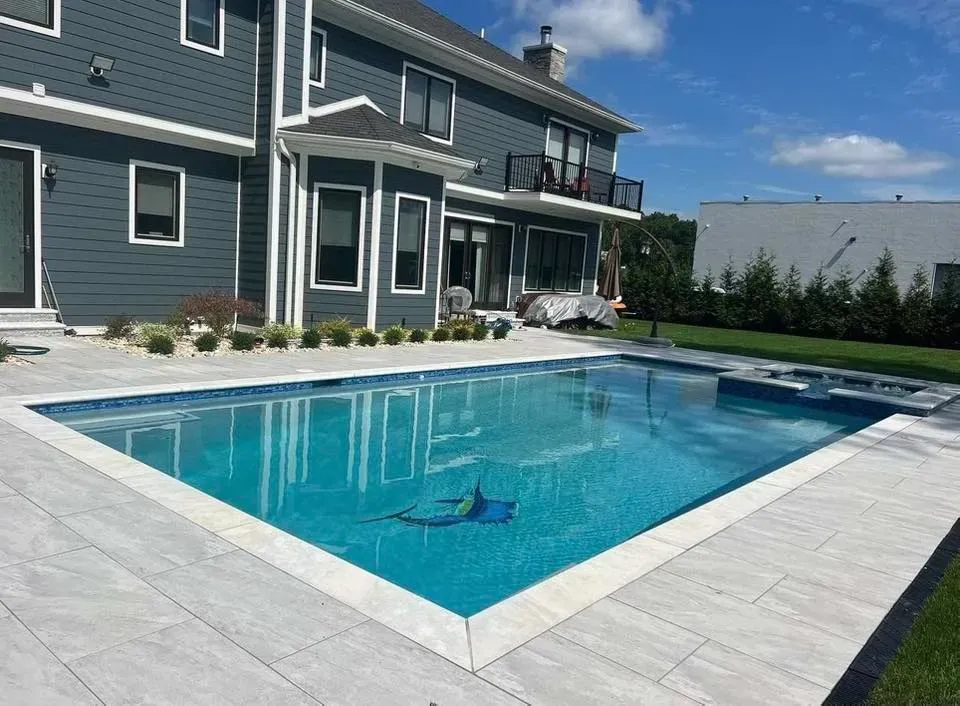 Transform your backyard into a stunning oasis with our expert pool construction services, offering custom designs and quality craftsmanship to create the ultimate relaxation and entertainment space for your home. for S&G Hardscaping and Plowing in Boston, MA