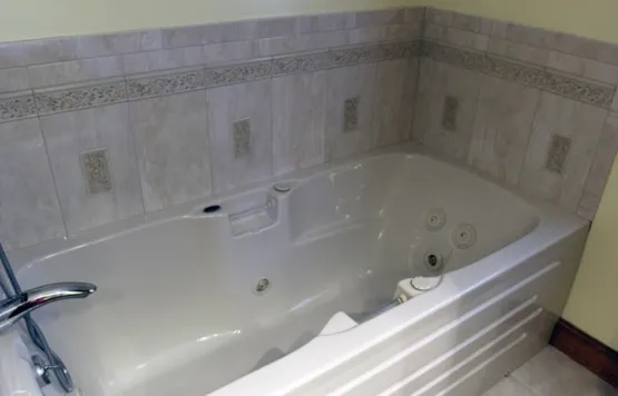Installed soaking tub with tile surround