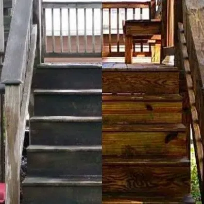 Stairs, half cleaned. Left side: dirty, dark wood. Right side: cleaned, stained, natural wood.