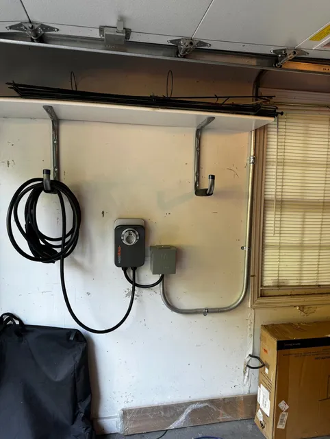 Electric Vehicle Charger Mounted on a Wall