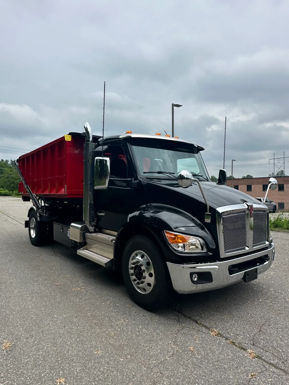Arsenal Waste Management roll-off truck serving Merrimack NH - all-inclusive dumpster rental