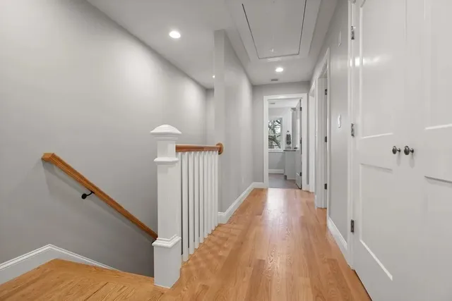 Finish carpentry stair railing and hallway trim work in Wakefield, MA