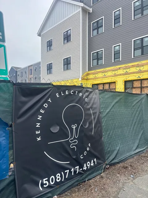 Kennedy Electric banner at Hyannis Lofts construction site