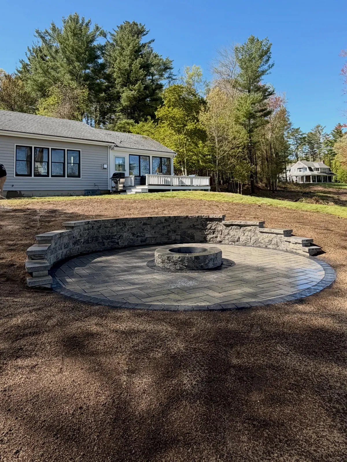 Clean lines, timeless curves, and a backyard built to bring people together. 🔥

This custom fire pit patio and seating wall was brought to life using premium Techo-Bloc products from top to bottom — blending durability, comfort, and a clean modern finish that fits perfectly into the landscape.

Built for long nights, good company, and memories around the fire.

#TechoBloc #FirePitPatio #HardscapeDesign #BackyardGoals #SouthShoreGreen