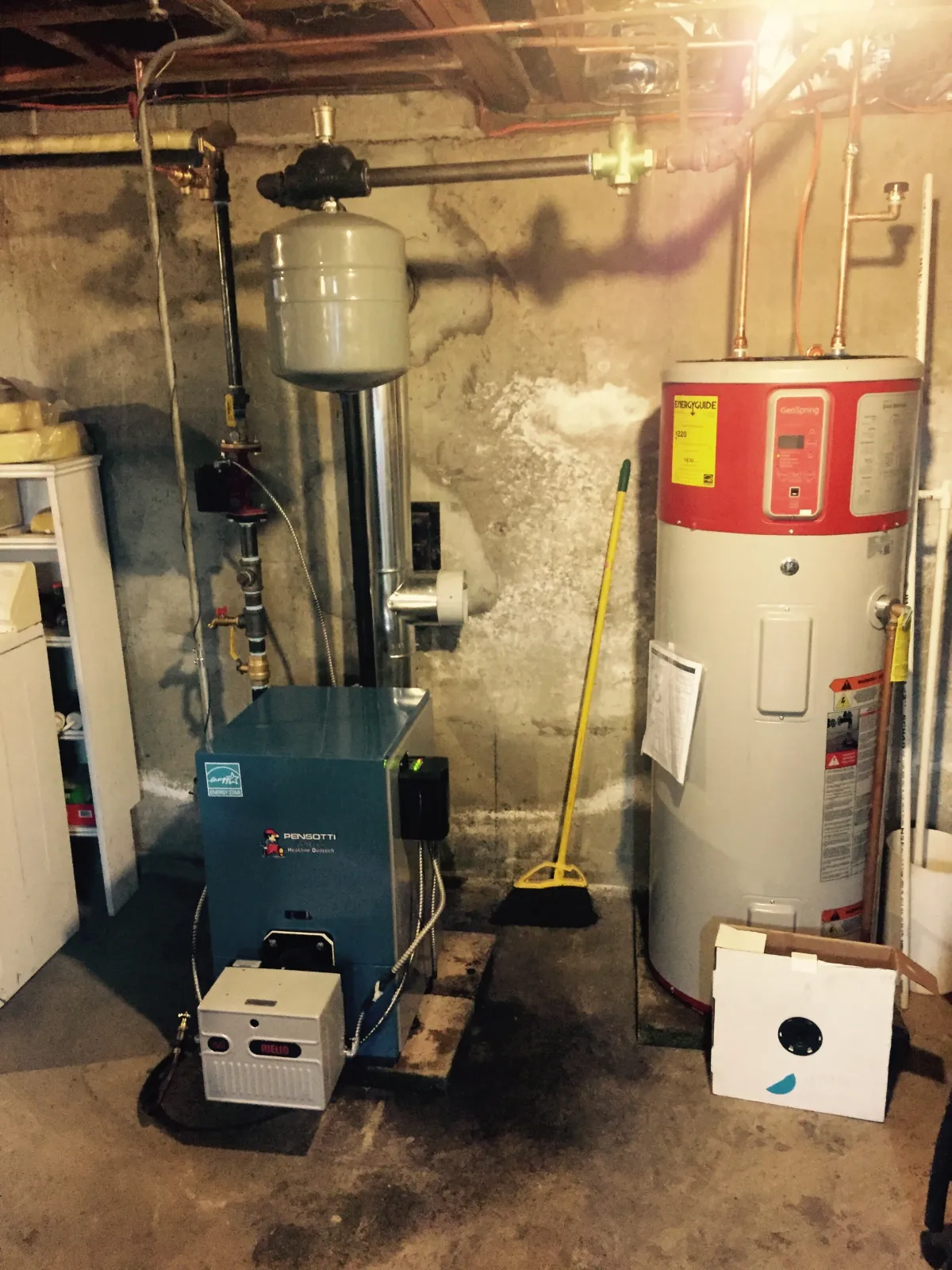 Basement with water heater and boiler setup