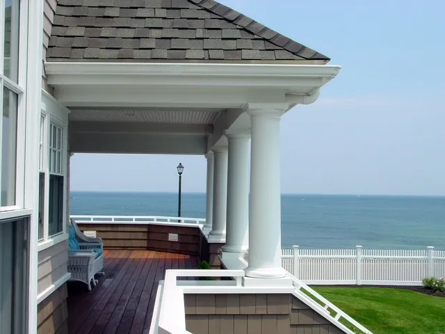 Oceanfront porch of a Chilton Development custom home in Scituate, MA with sweeping ocean views