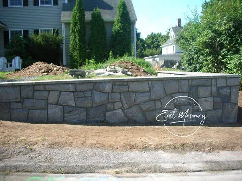 Retaining stone wall