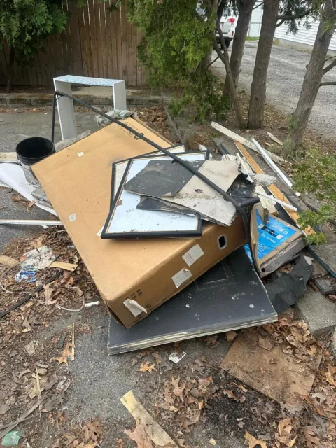 cardboard and picture frame junk pile