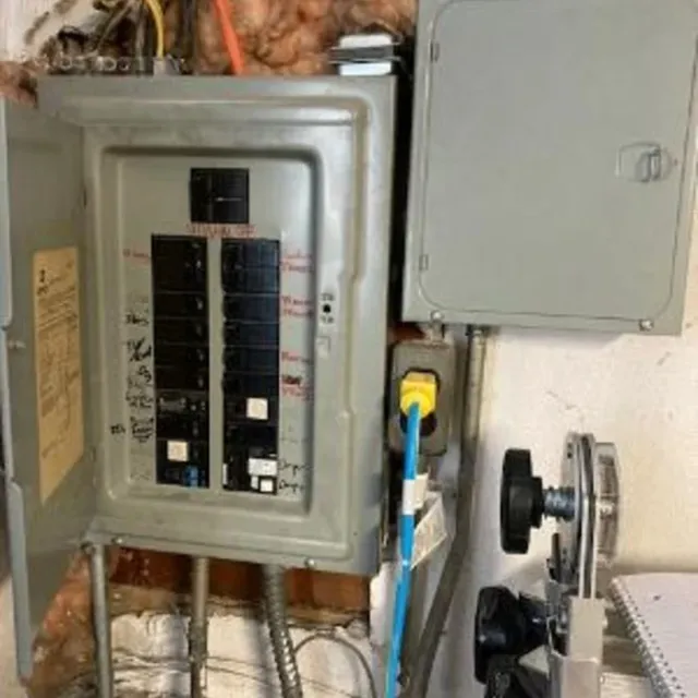 Electrical service panel with labelled breakers and new circuit runs