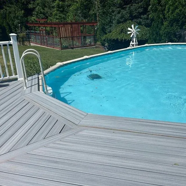 Composite deck built around a pool