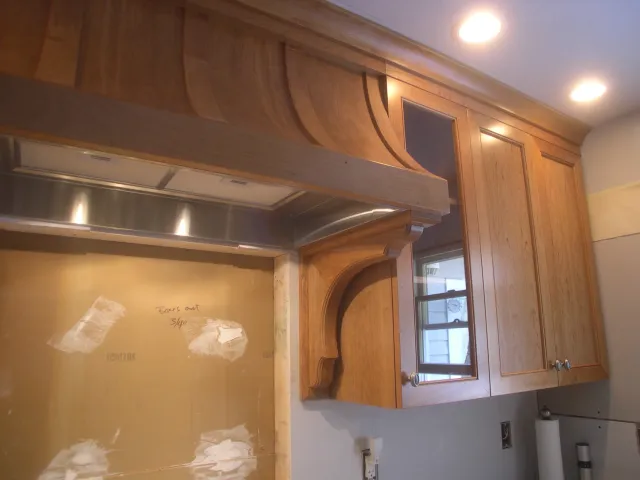 Cherry kitchen with tall peninsula - Hood detail
