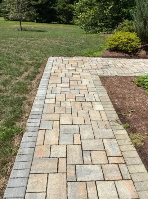 After Irrigation Rust Stain Removal from a Paver Walkway in Worcester County, MA — Pro Pressure Washing