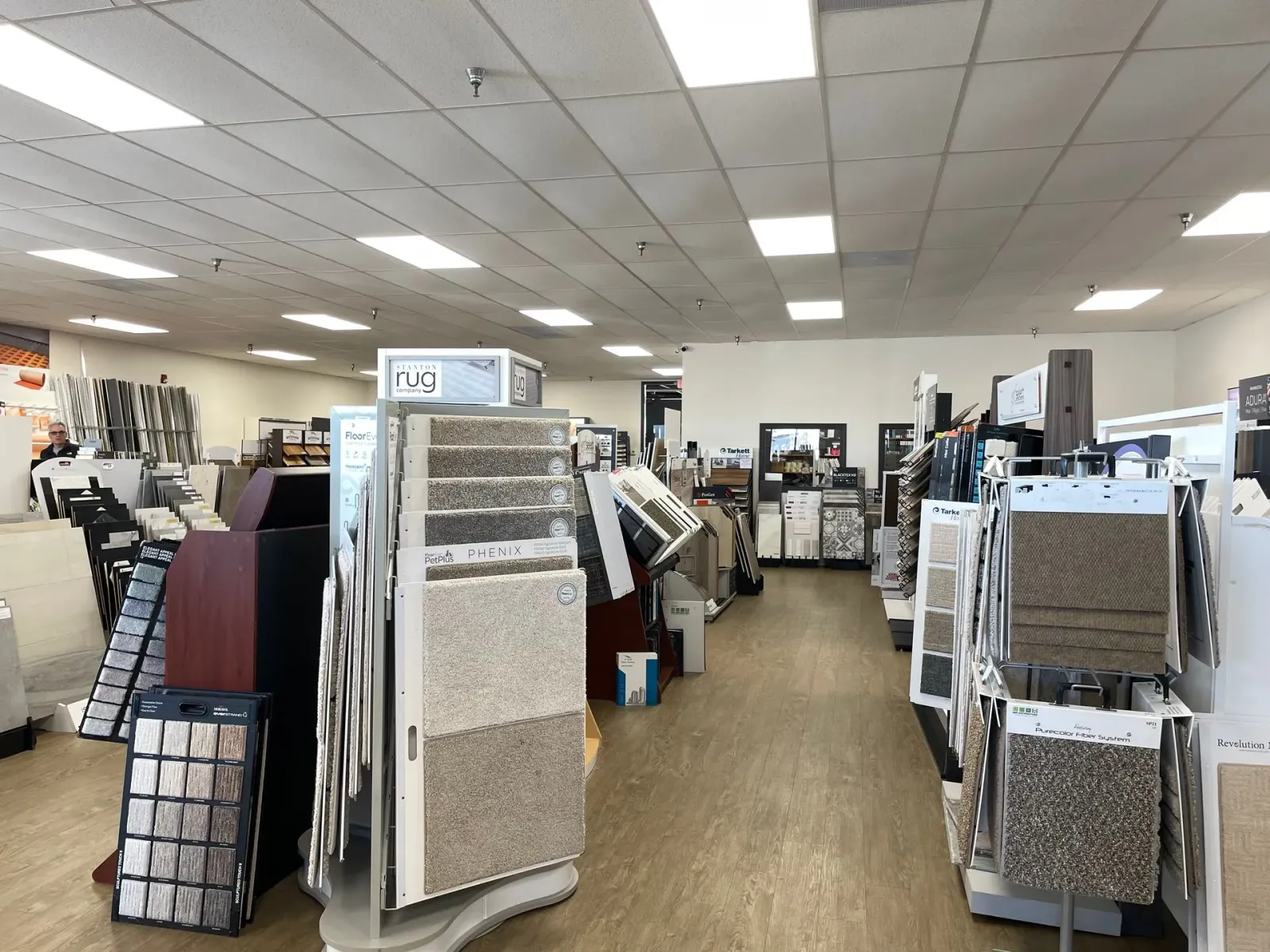 A large room filled with lots of carpets and tiles.
