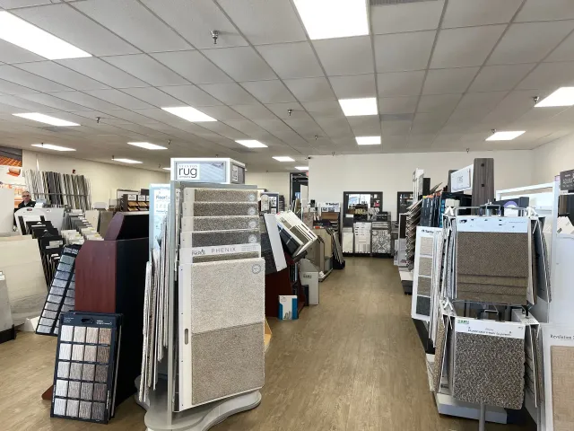 A large room filled with lots of carpets and tiles.