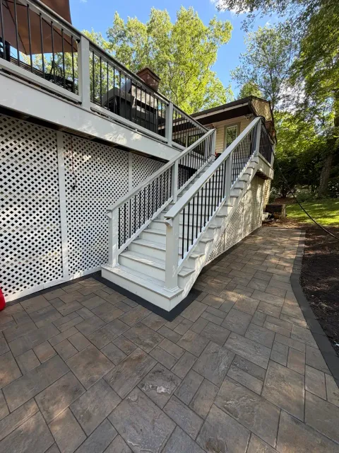 Finished stair landing and curved walkway during the Bellingham Massachusetts patio project
