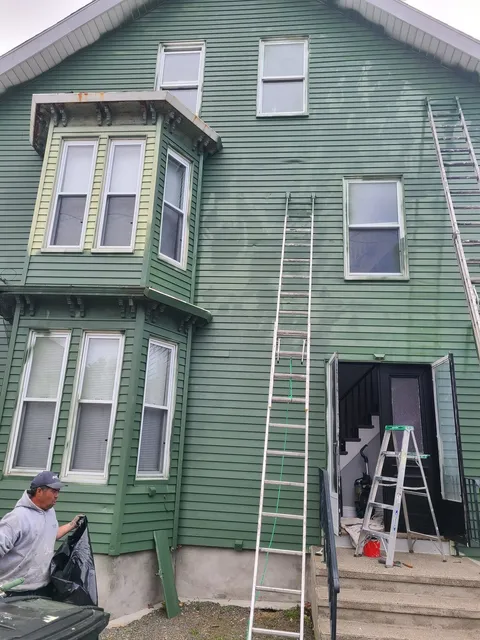 Three-family exterior restoration — before