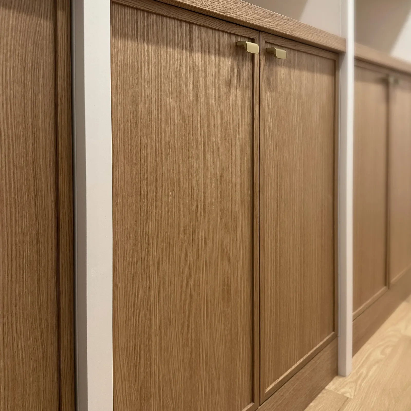 Custom cabinetry and built-ins designed and handcrafted for a walk-in closet in Newton, Massachusetts.