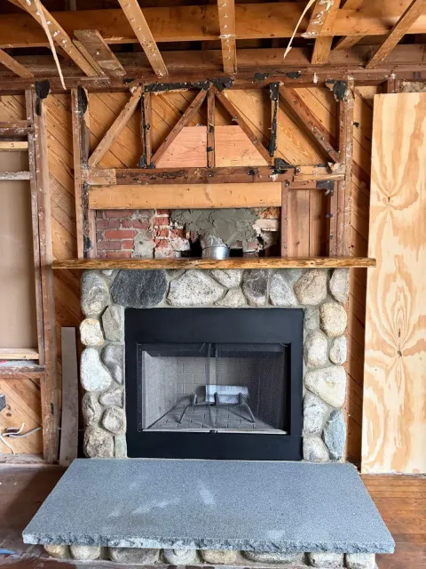 Interior fieldstone fireplace — restored — Chimney Goat, Boston MA