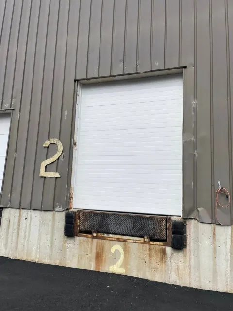 Warehouse loading dock door labeled