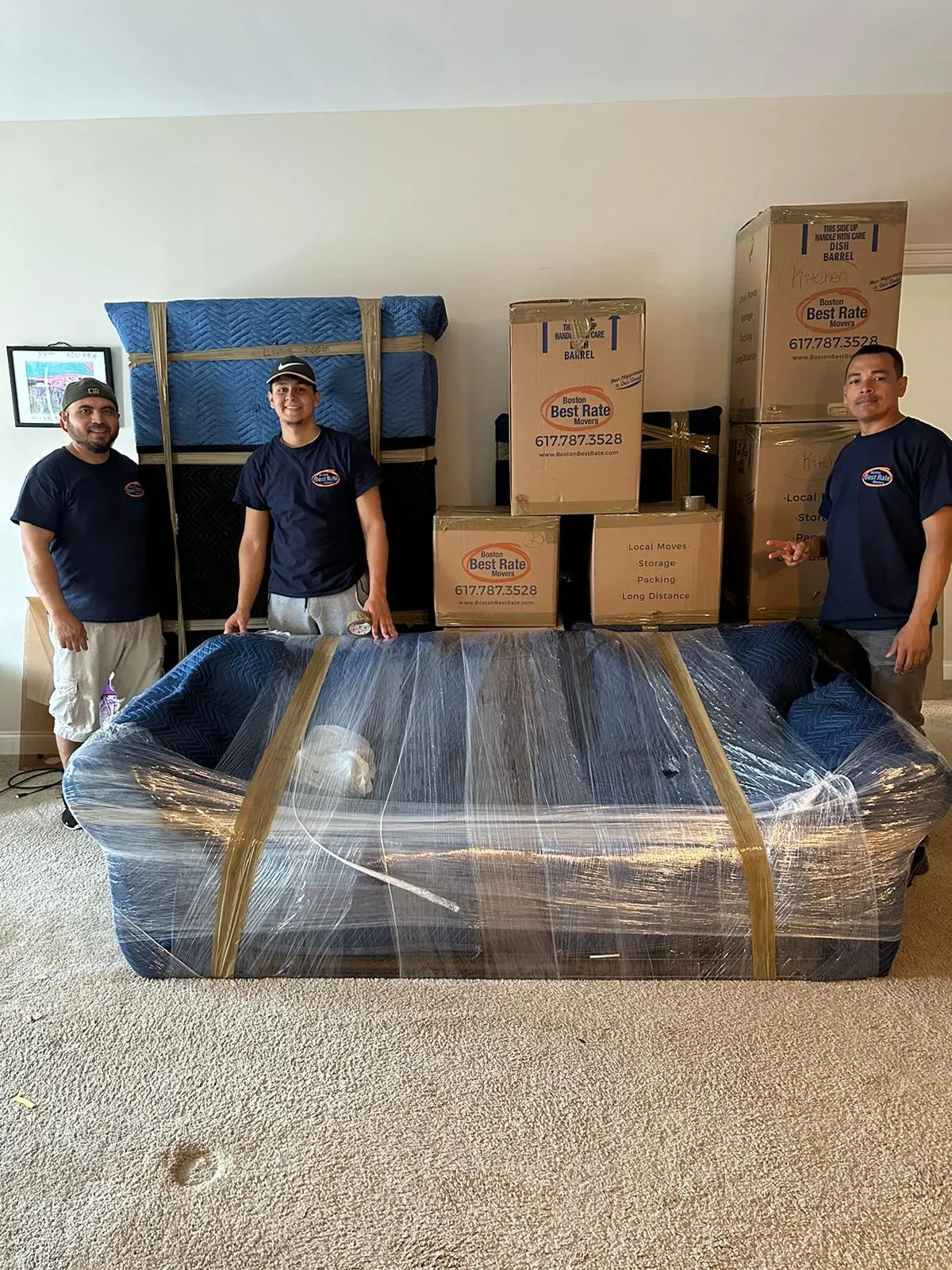 Boston Best Rate Movers team posing during a successful move