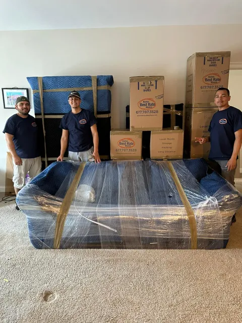 Boston Best Rate Movers team posing during a successful move