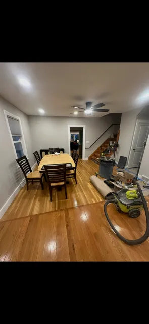 Boston Light & Power electrician installing a dining room ceiling fan and recessed lighting in Braintree, MA.