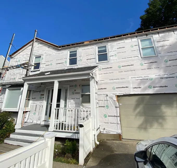 Needham Massachusetts home during siding replacement