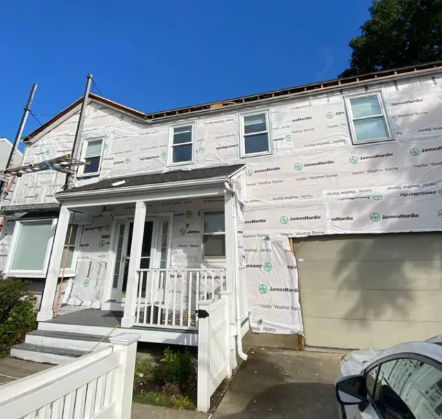 Needham Massachusetts home during siding replacement