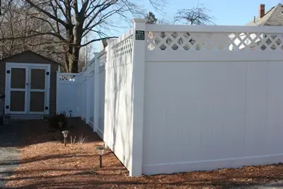 White vinyl privacy fence with lattice top