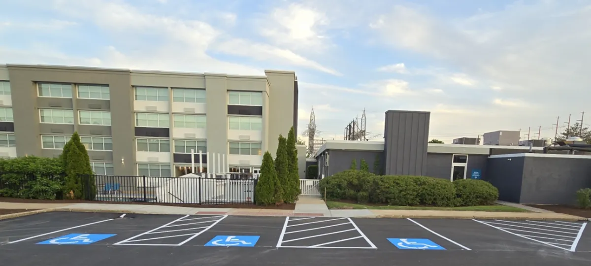 New asphalt driveway with clean, sharp edges