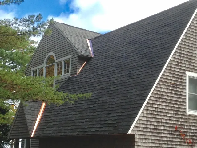 work photo from justroofingmaine.com