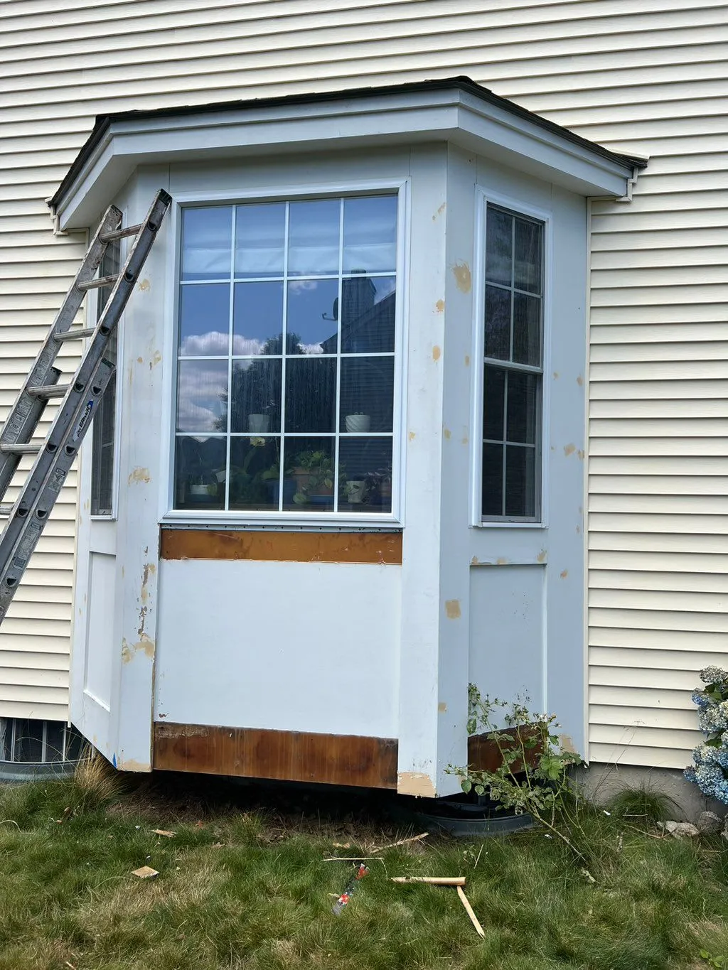 Bay window bump-out during exterior repair and repaint