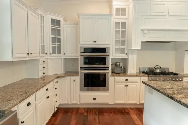 Cream white kitchen with detailed painted cabinet work