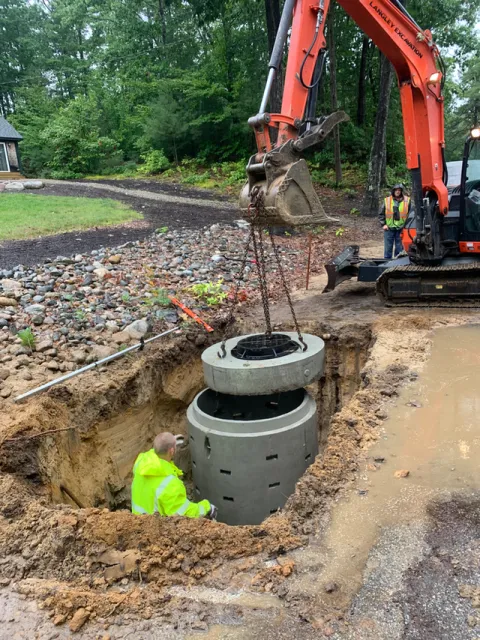 Utility being installed with excavator