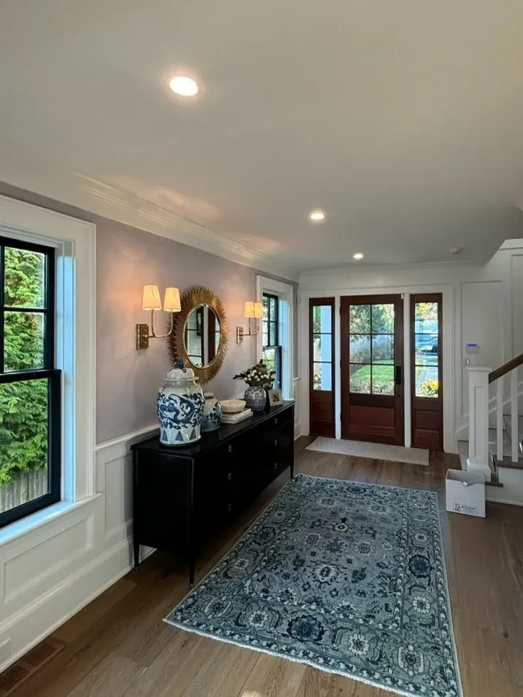 Entry hall sconce and recessed lighting