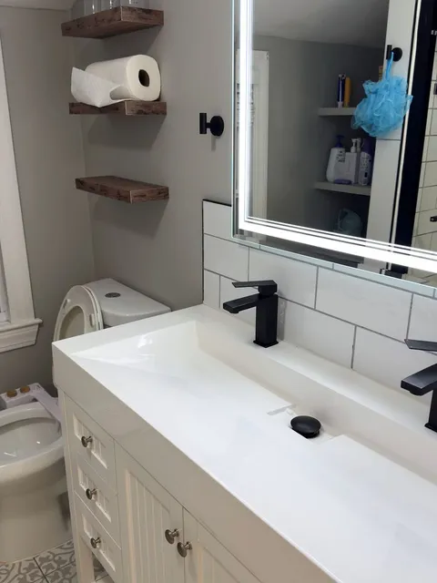 Sparkling clean bathroom sink after cleaning