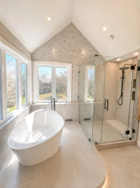 Fully renovated bathroom with new tile and vanity