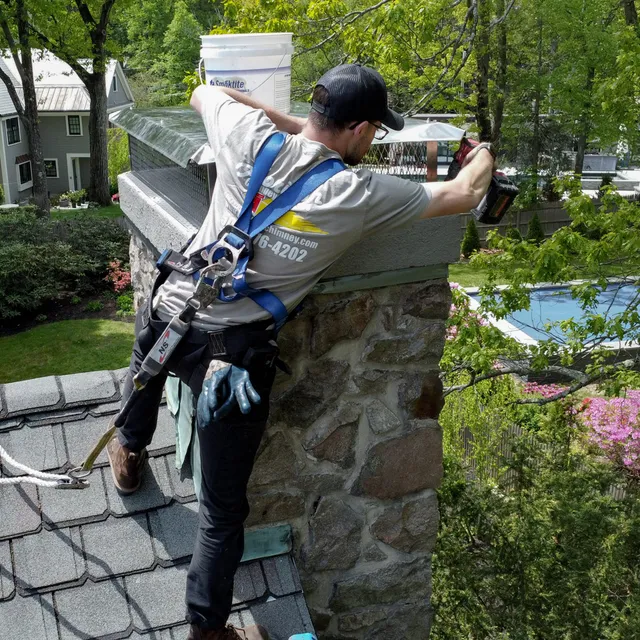 Installing new chimney caps and covers in Cumberland, RI & Newton, MA