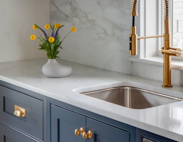 Blue Cabinetry with Marble Counter