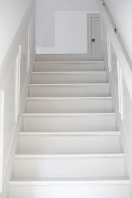 Rebuilt staircase with new trim and finish