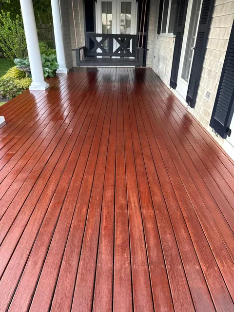Restored outdoor wood deck by HMS Painting