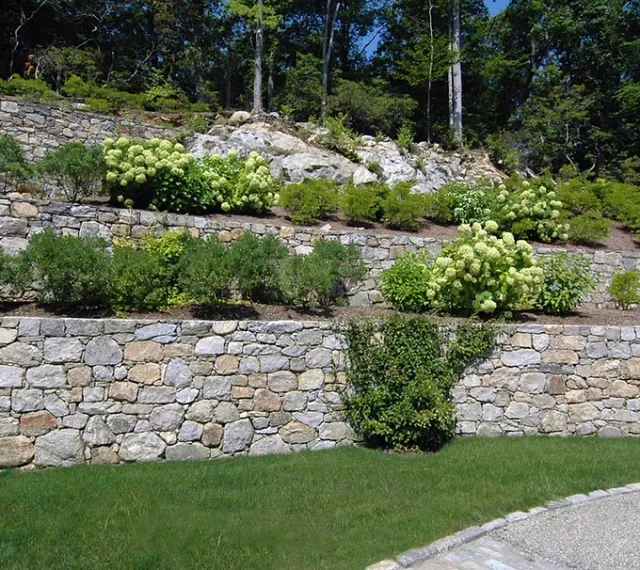 Custom stone barbecue grill built by Shkembi Masonry in Connecticut